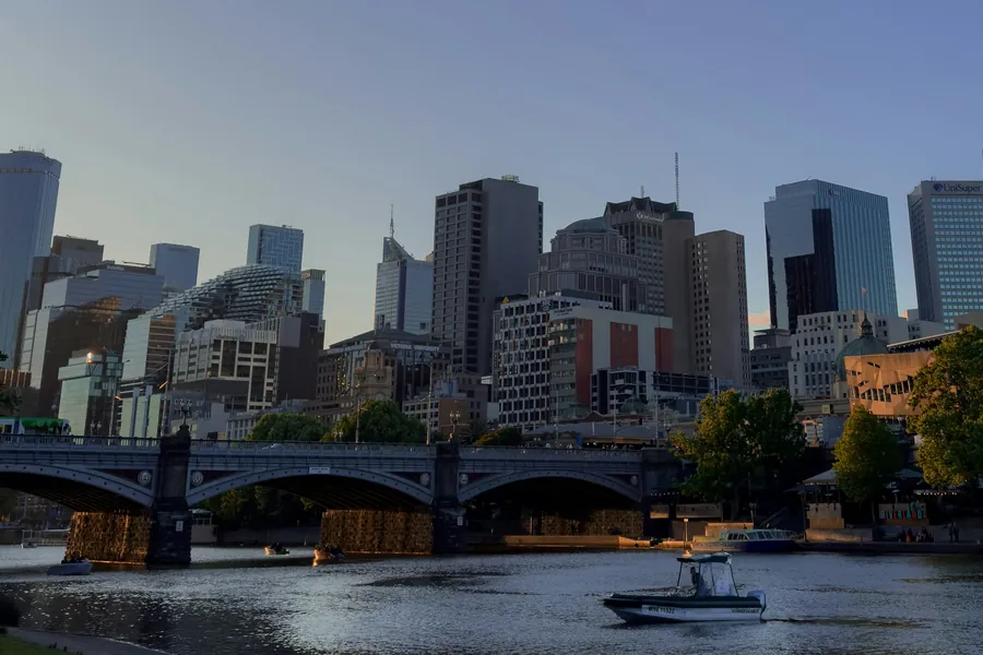 A boat on the Yarra River below the Melbourne skyline